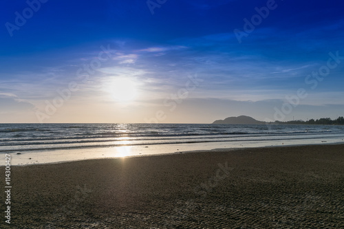 Summer time on sky and sand of beach