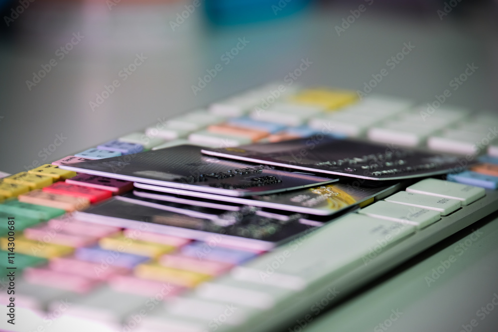 Credit card on computer keyboard Credit card on computer keyboard
