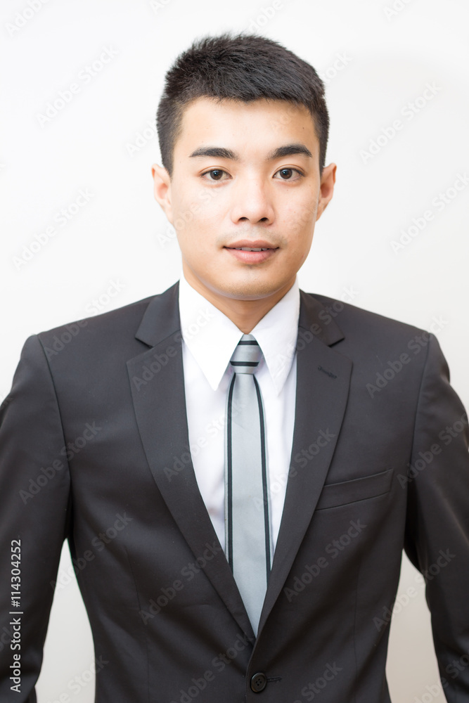 Asian handsome smart young business man on black suit smilling Asian handsome smart young business man on black suit smilling