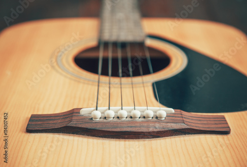 detail of classic guitar with shallow depth of field