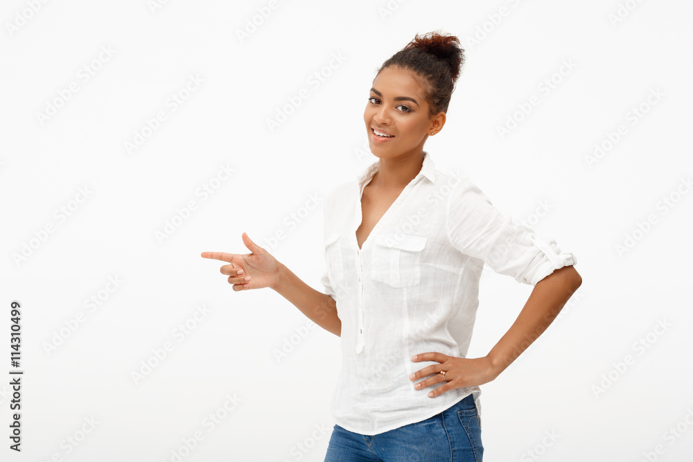 Portrait of young beautiful african girl over white background. Portrait of young beautiful african girl over white background.