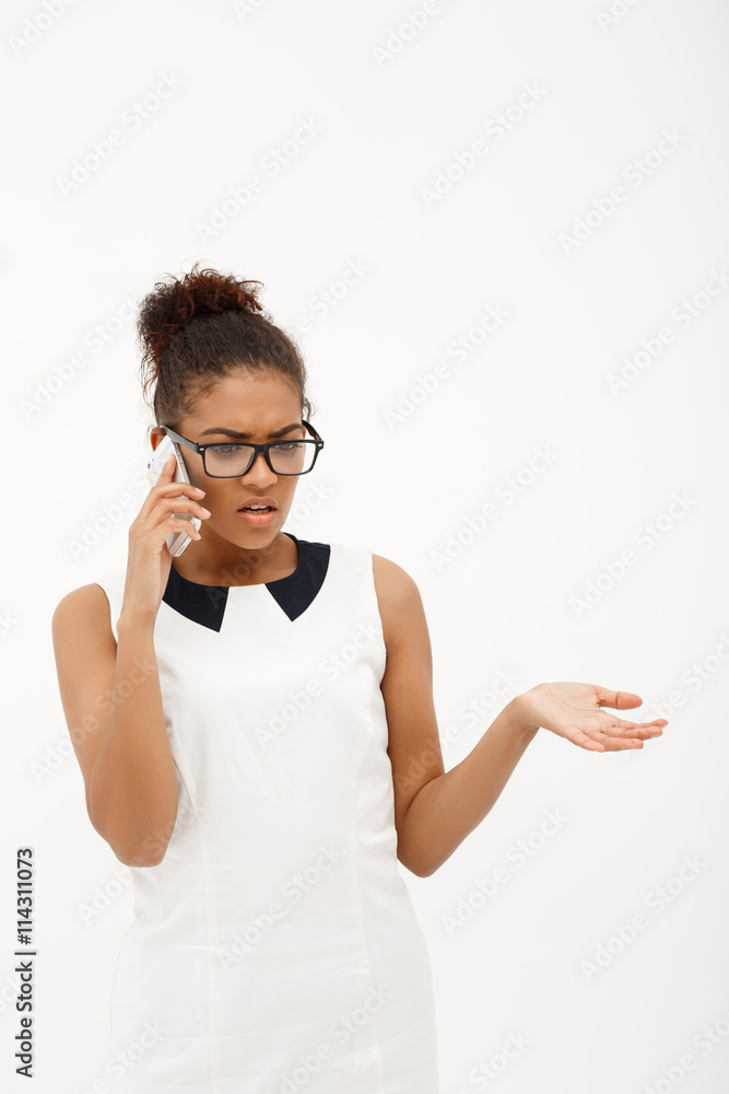 Portrait of young successful african business lady over white ba Portrait of young successful african business lady over white ba