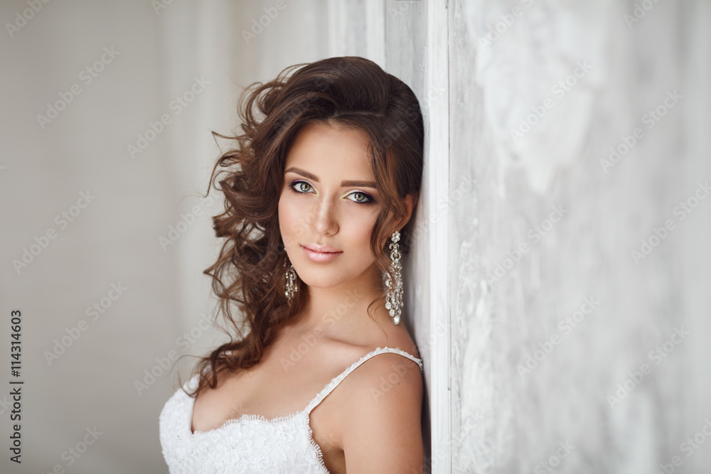Studio portrait of beautiful bride with perfect hairstyle and ma Studio portrait of beautiful bride with perfect hairstyle and ma