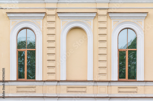 Two windows in a row on facade of Secondary school №232, St. Petersburg, Russia.