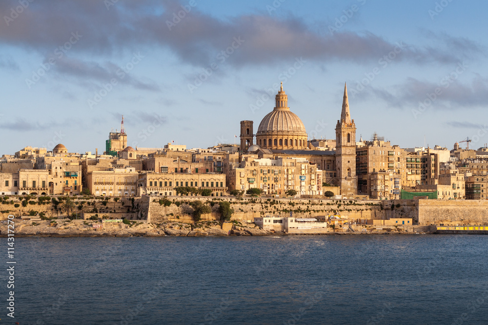 Valletta capital of Malta, under golden sun.