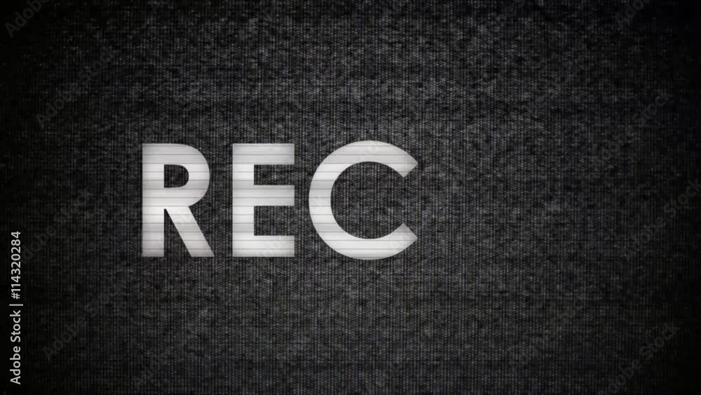 A big white flashing REC text with a big red dot (recording message from a camera's viewfinder) with the noise and distortion of an old CRT TV. A big white flashing REC text with a big red dot (recording message from a camera's viewfinder) with the noise and distortion of an old CRT TV.