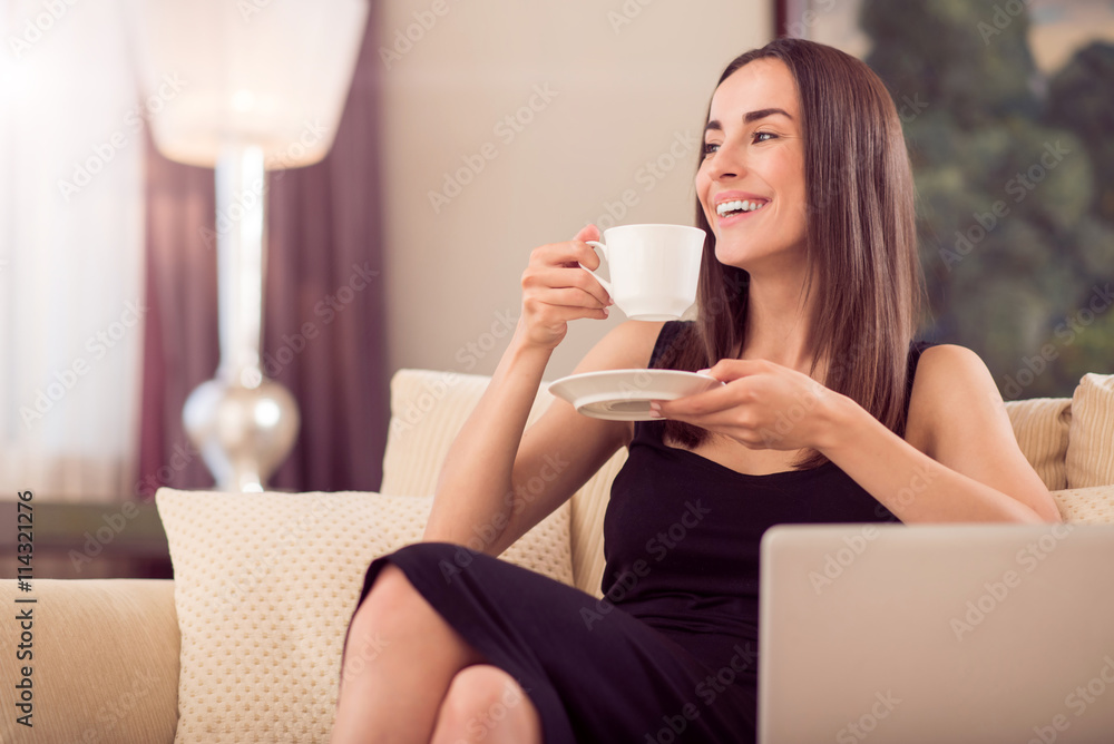 Beautiful woman holding cup of coffee