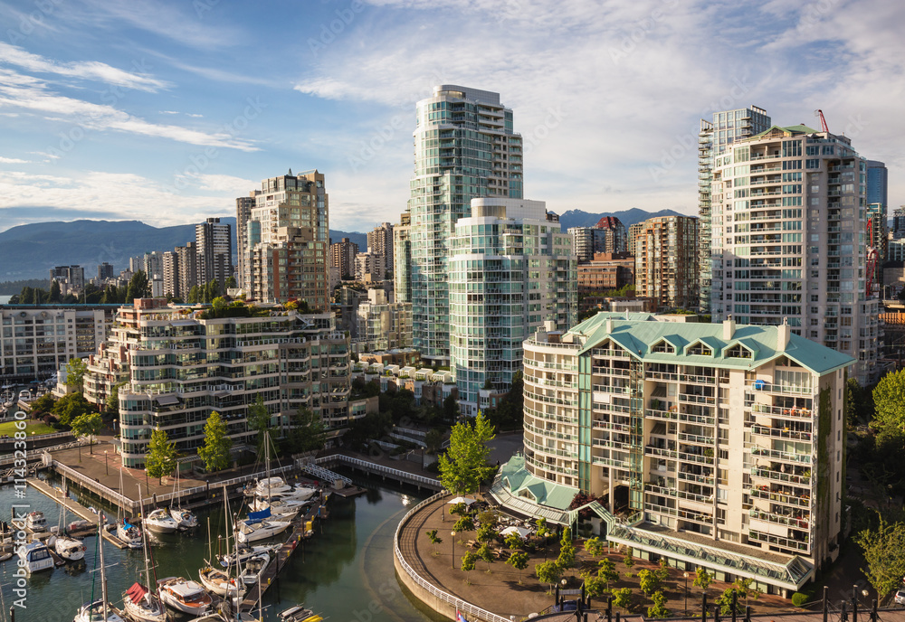 View of Downtown Vancouver and Burrard Bridge at False Creek during sunny evening