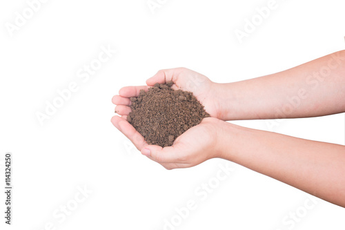 Hand holding soil isolated on white background