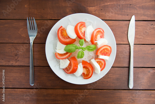 caprese on rustic table