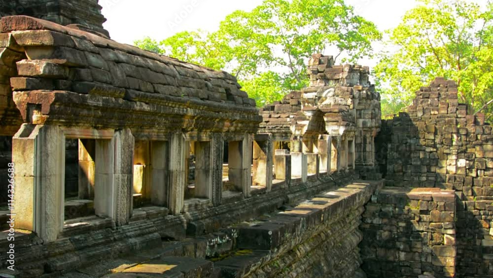 Video FullHD - Ancient stonework of a ruin at Angkor Wat displays architectural and construction methods despite the current, crumbling state of the structure. Video FullHD - Ancient stonework of a ruin at Angkor Wat displays architectural and construction methods despite the current, crumbling state of the structure.