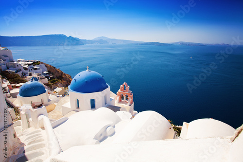  Greece, Santorini Island, Oia Town. Blue  Roof, White Houses an © millaf