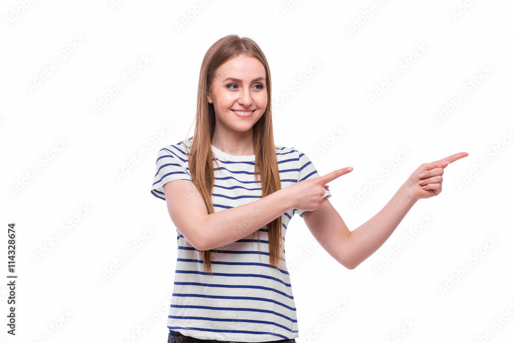 Girl pointed on side on advertising on white Girl pointed on side on advertising on white