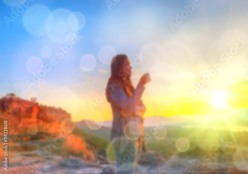 Abstract Blurred and soft photo of Women on hilltop