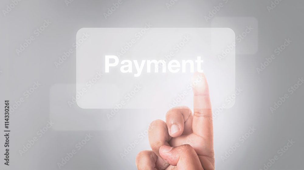 hand pressing payment button