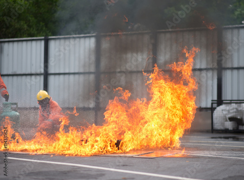 Firefighter fighting fire during training