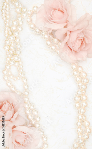 Feminine background with roses and pearls