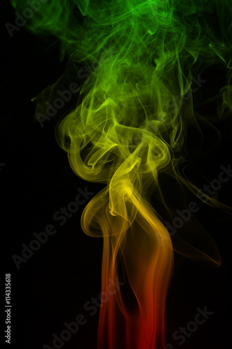 Smoke background reggae colors green, yellow, red colored in flag of reggae music