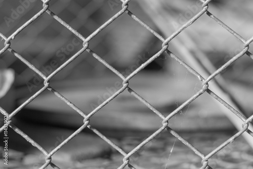Steel Cage black and white background .