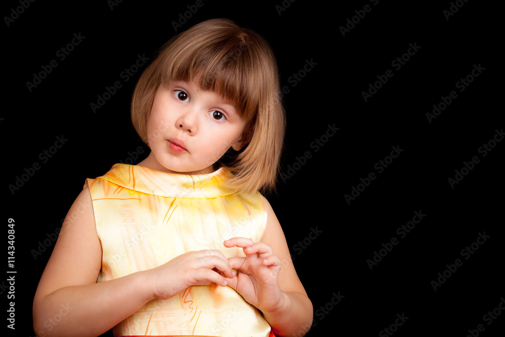 Studio portrait of funny little Caucasian blond girl Studio portrait of funny little Caucasian blond girl