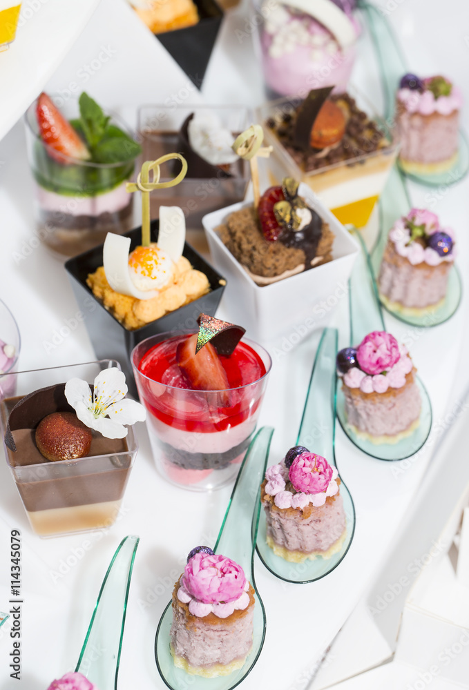 mini canapes in plastic cups decorated with edible flowers mini canapes in plastic cups decorated with edible flowers