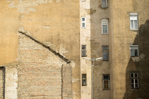 Budapest old distressed buildings/houses with windows and firewall/brandmauer photo