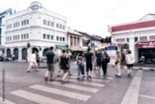 Abstract blurred image of People walking across the street. Retro and vintage style