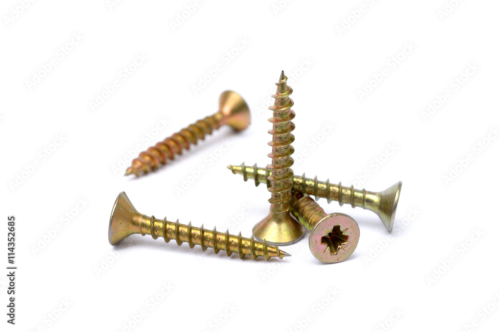 Pile of wood screws isolated on white background Pile of wood screws isolated on white background