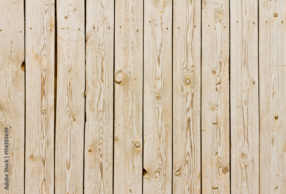 wooden fence of vertical planks wooden fence of vertical planks