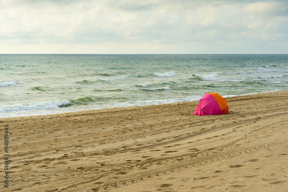 Beautiful tropical beach under gloomy sky Beautiful tropical beach under gloomy sky