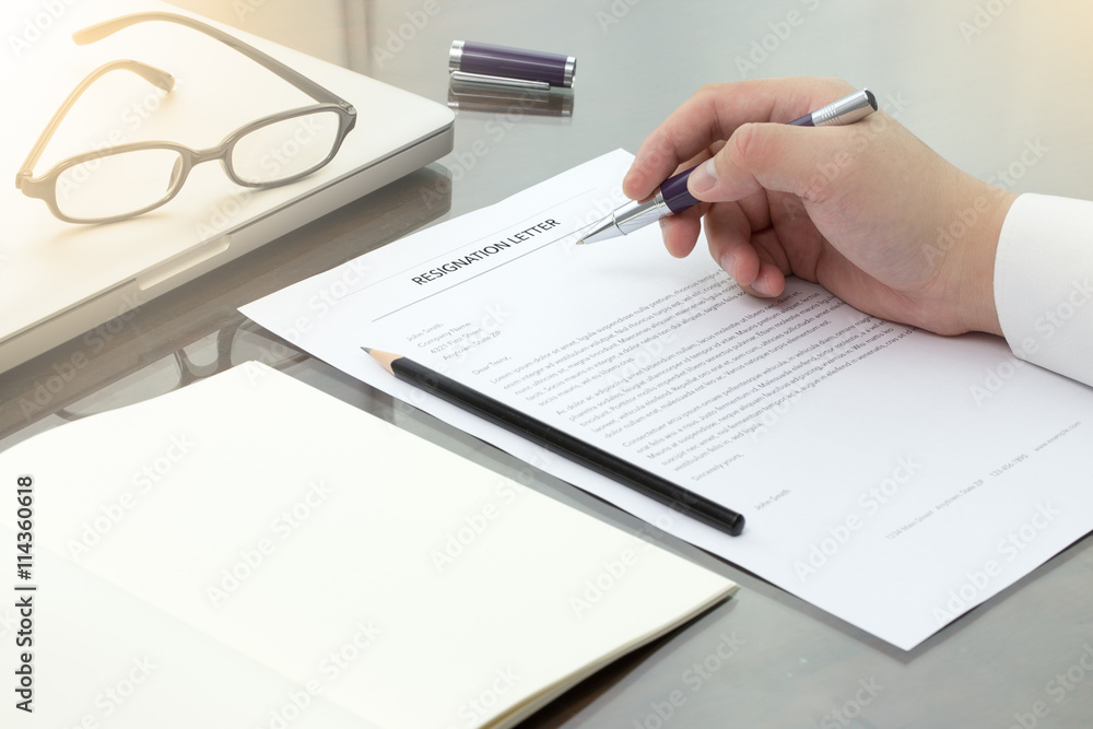 Resignation letter information with pen, pencil and glasses. Resignation letter information with pen, pencil and glasses.