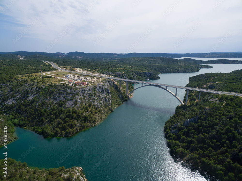 Aerial view of the Krka Bridge spanning the rver, Croatia. Aerial view of the Krka Bridge spanning the rver, Croatia.