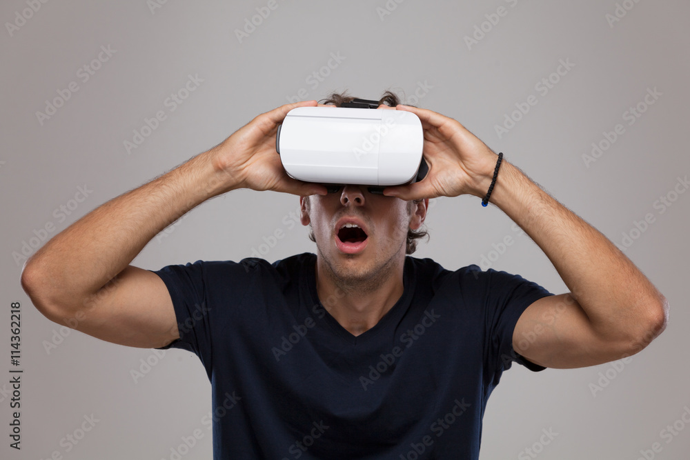 Young man with virtual reality glasses on the head Young man with virtual reality glasses on the head