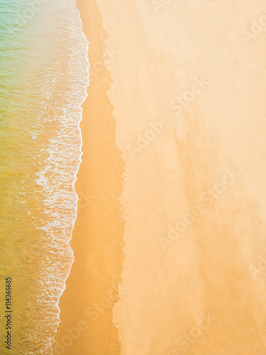 soft foam of wave reaching on the sea shore