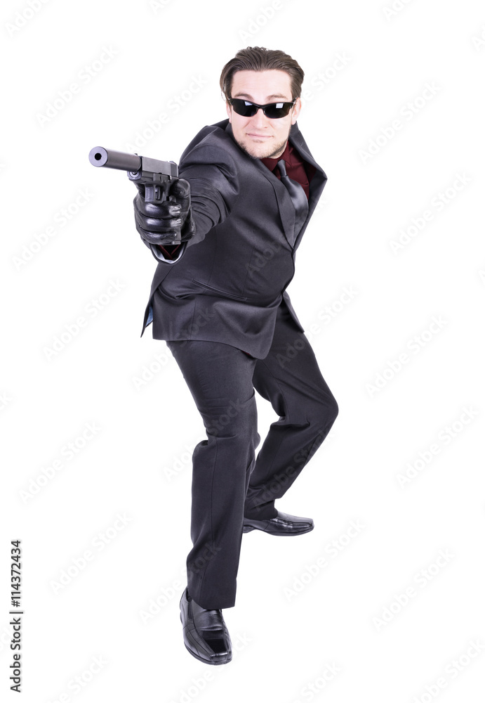 Elegant gangster ready to shoot, isolated on white background. Elegant gangster ready to shoot, isolated on white background.