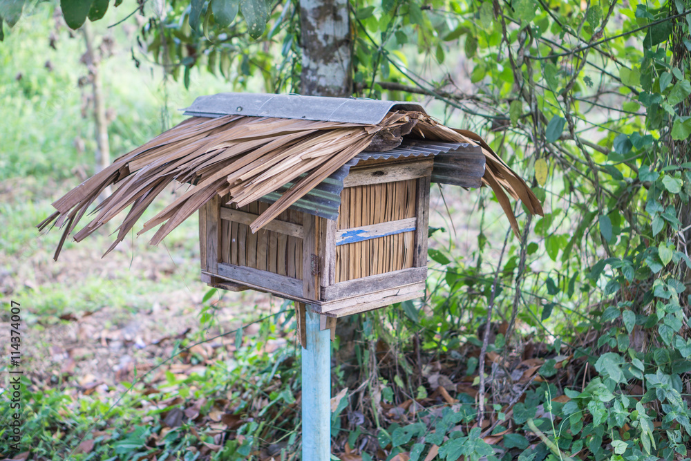 Wooden bee house in the garden Wooden bee house in the garden