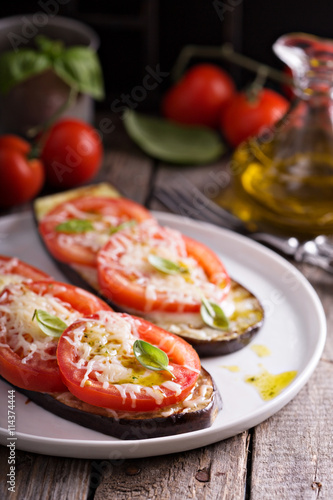 Grilled zucchini with tomatoes and cheese