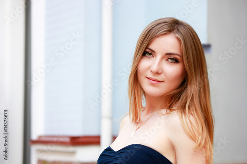 beautiful blonde woman in prom dress