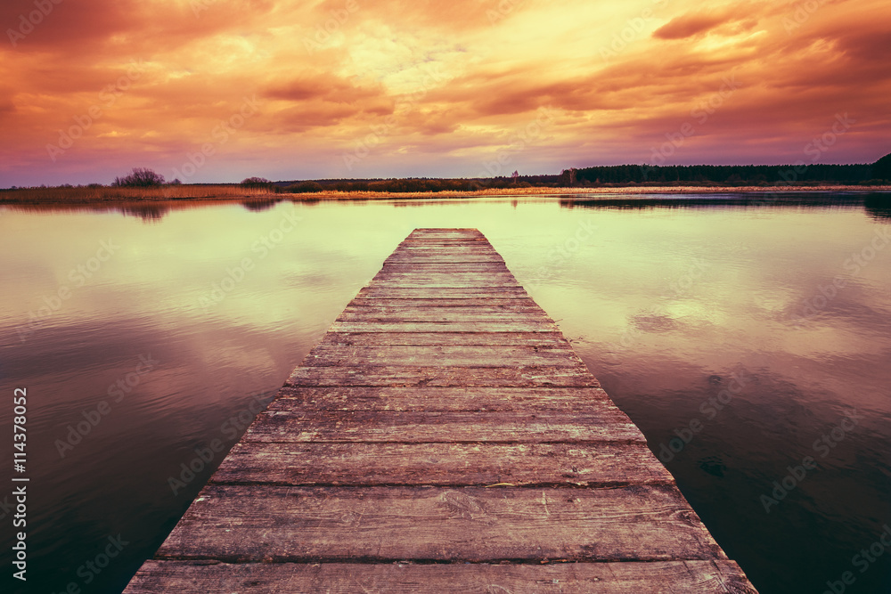 Old Wooden Pier, Calm River At Colorful Sunset Sunrise
