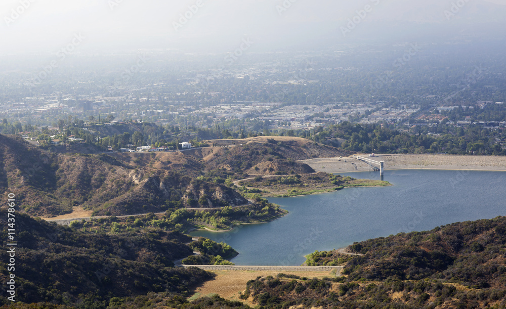 Reservoir in the mountains of Los Angeles. Mountain landscape near Los Angeles, California. The view out over the lake and city.