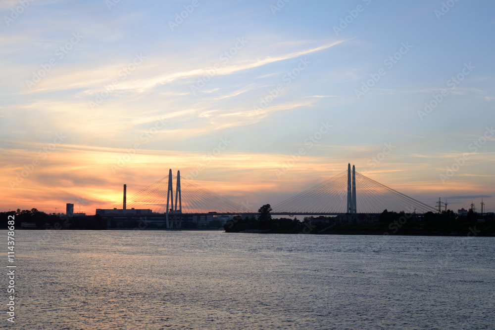 Cable-stayed bridge at sunset.