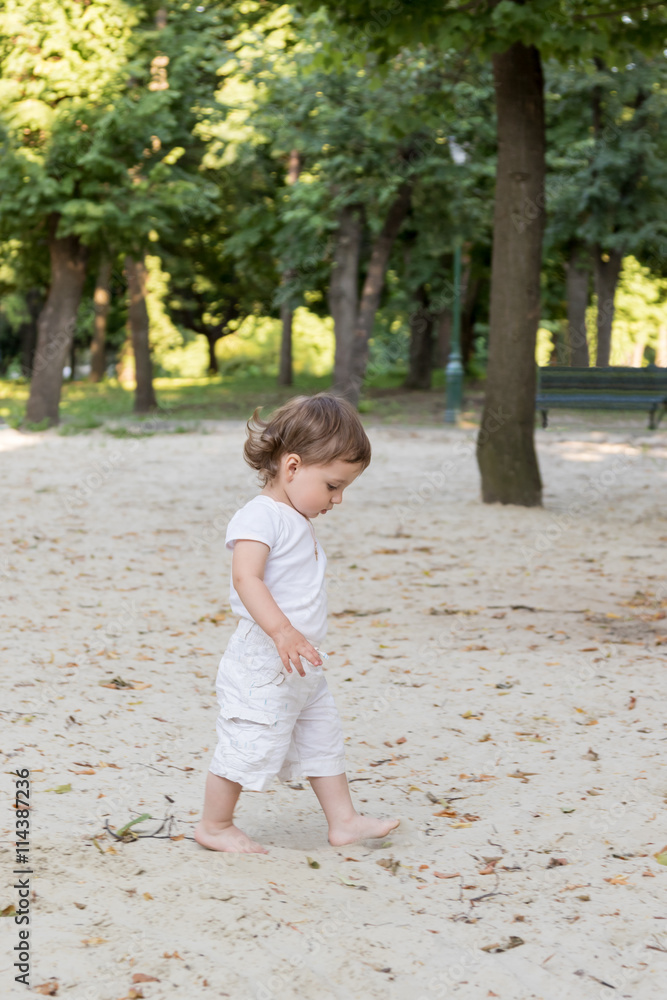 Boy walking in the park Boy walking in the park