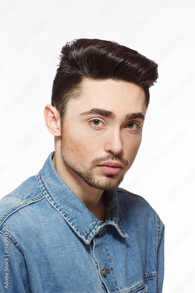 Portrait of model man demonstrating hisgorgeous black hair over white  background. Male in jeans shirt with modern hairstyle in studio. Stock  Photo | Adobe Stock
