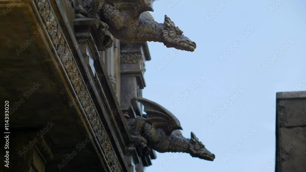 statues of dragons on medieval castle statues of dragons on medieval castle