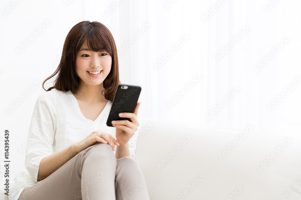 attractive asian woman using smart phone attractive asian woman using smart phone