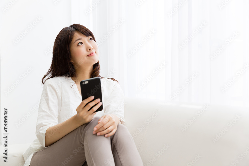 attractive asian woman using smart phone attractive asian woman using smart phone