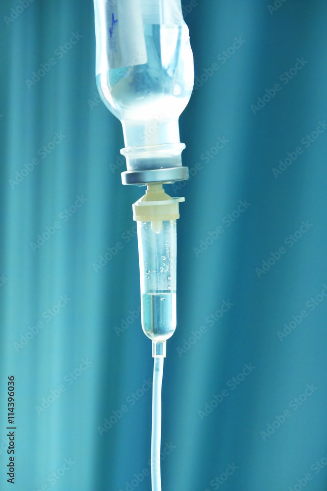 Medical drip on blurred background of hospital room Medical drip on blurred background of hospital room