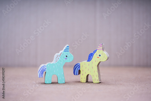 Wooden colorful unicorn horses