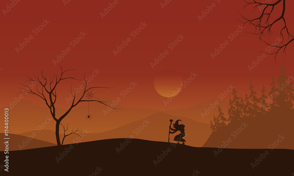 Silhouette of Halloween witch lonely