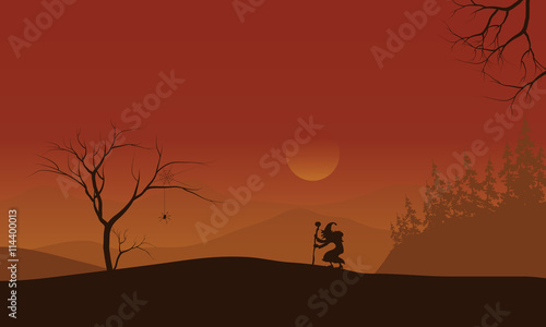 Silhouette of Halloween witch lonely